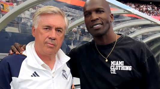 Chad Ochocinco Johnson wearing Miami Clothing Co. Oversized Tee and French Terry Shorts at El Clasico.