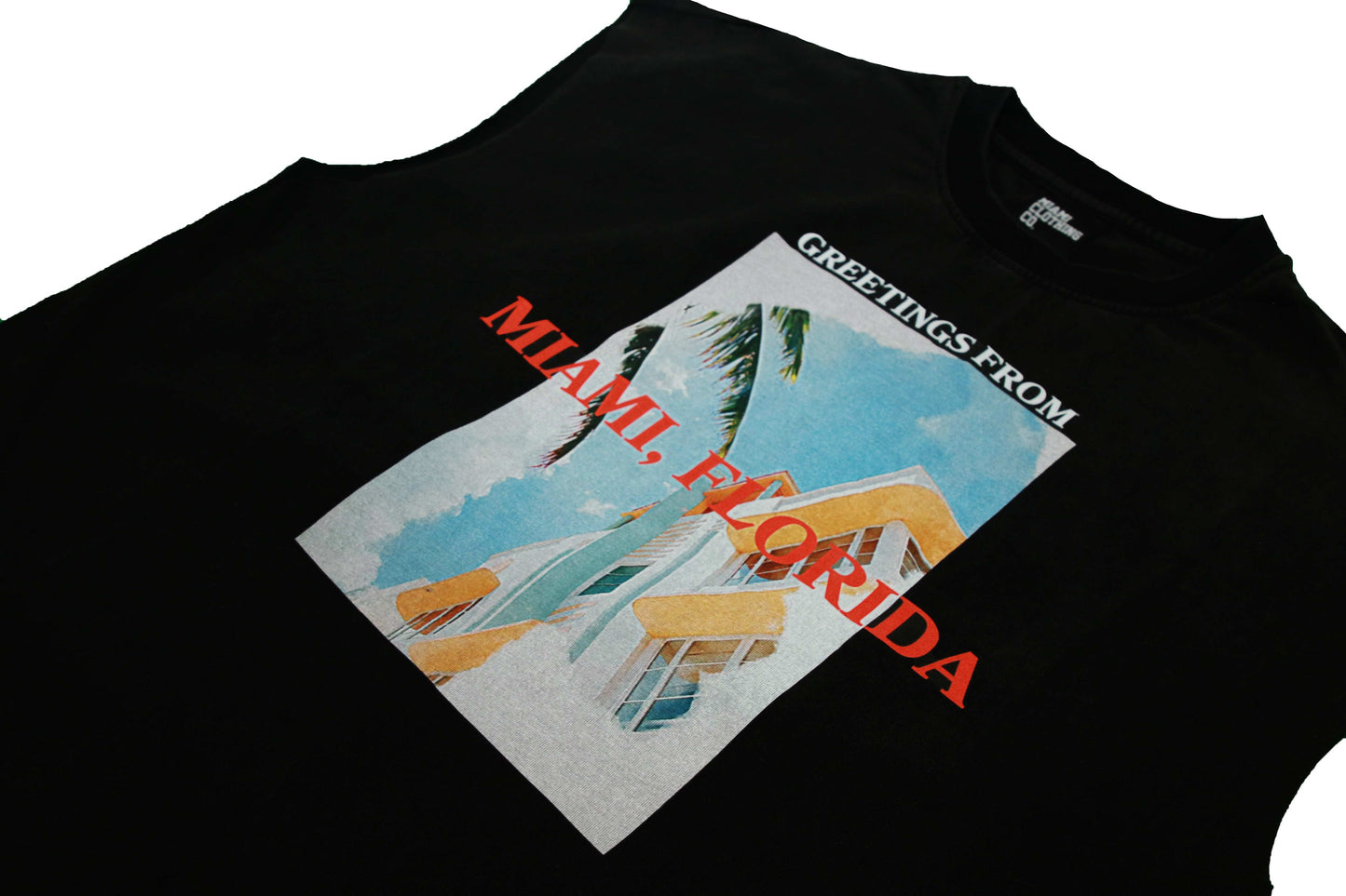 Sleeveless cutoff T-shirt with Miami graphic and "Greetings from Miami, Florida" text, made from 100% cotton. Miami t-shirt